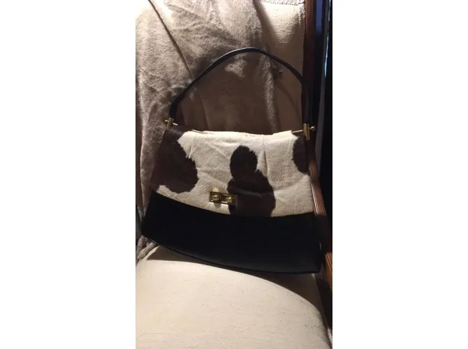 Autre Marque Cartera de cuero y cuero a medida en blanco y negro. 